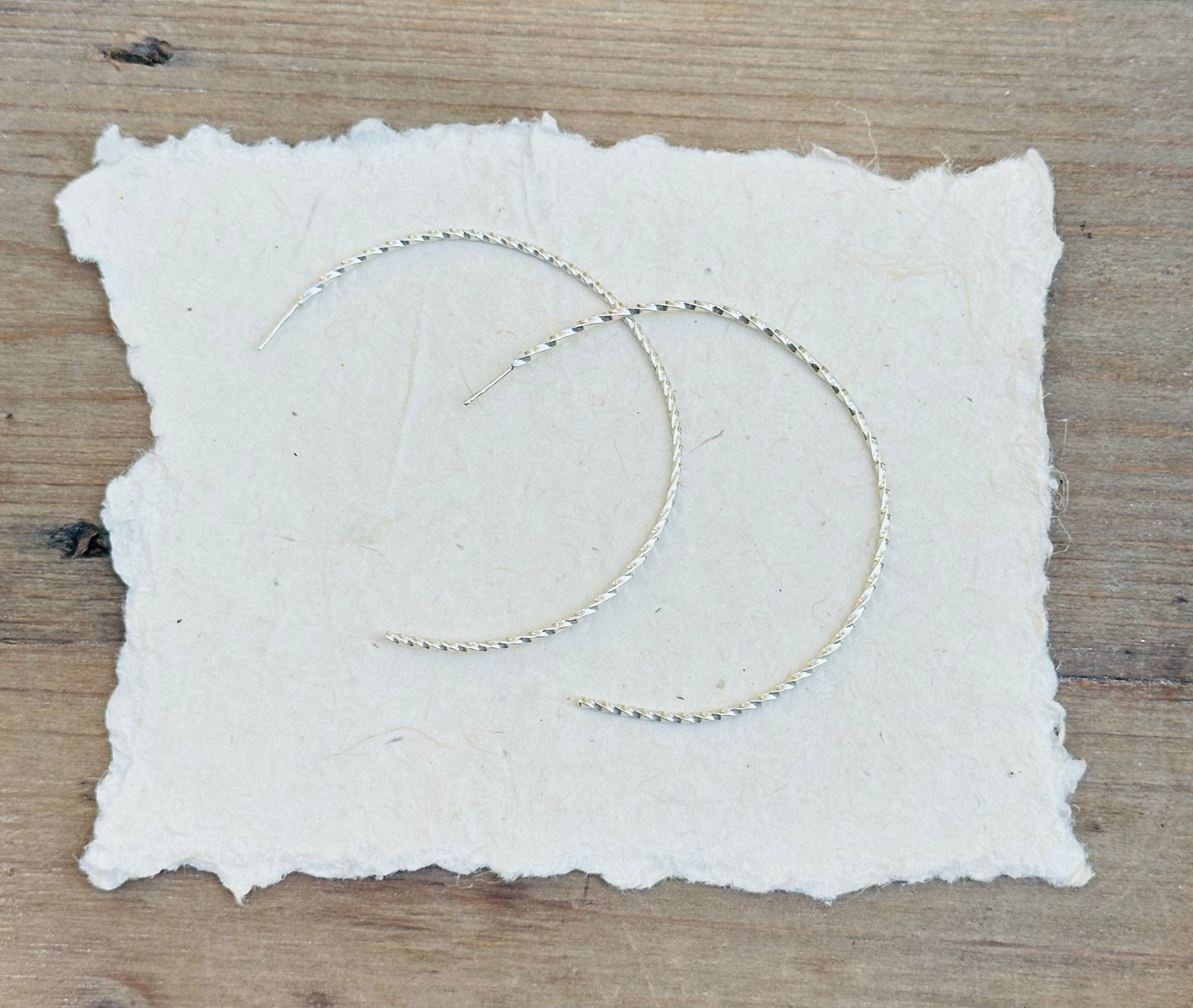 Large Twisted Hoops